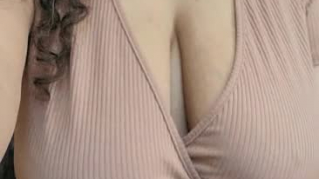 My huge breasts feel amazing in this tan wrap around top with no bra.