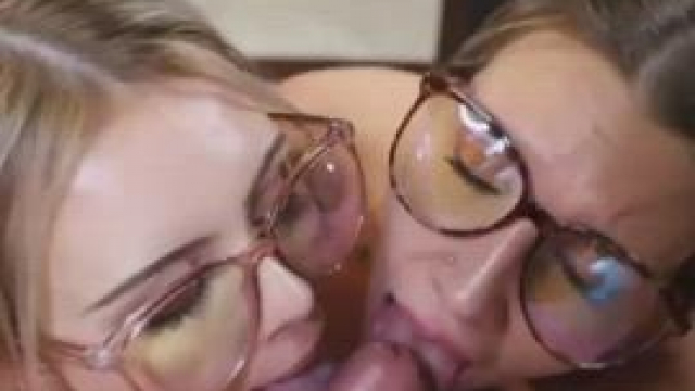 Double blowjob with glasses