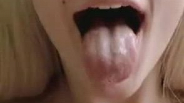 Nice blonde gets big cumload on tongue