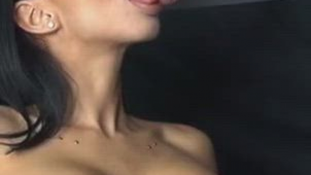 Beauty milks out a load onto her tits