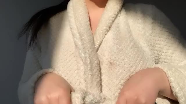 Revealing my huge tits under my robe...