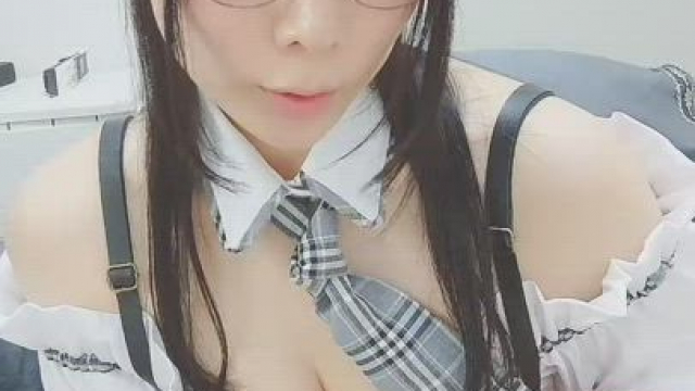 Curvy Japanese student revealing her tits