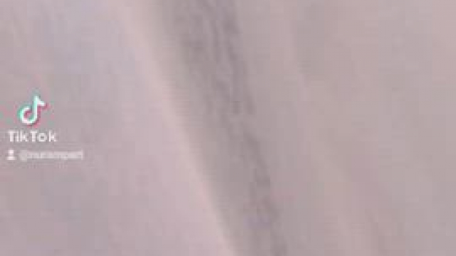 Indian lady performing on her balcony