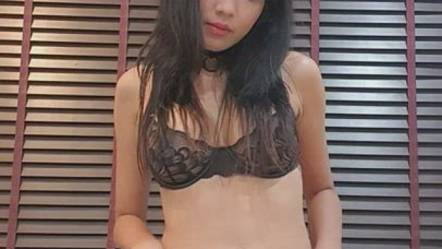Lovely Asian chick showing off her body