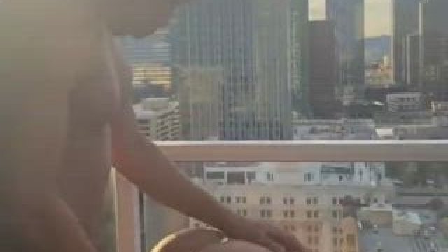 She gets her pussy pounded on the balcony!