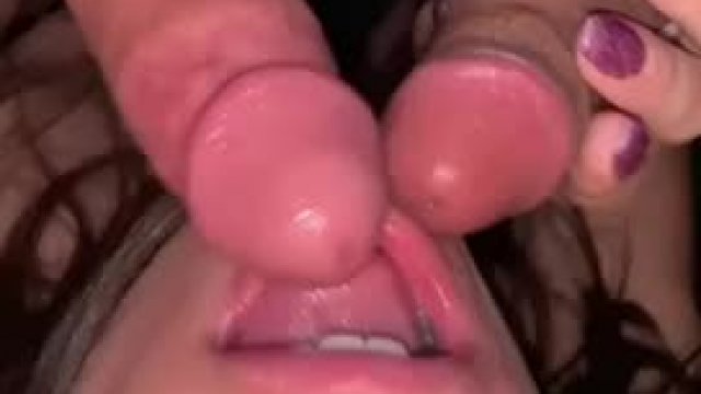 One woman sucking two dicks